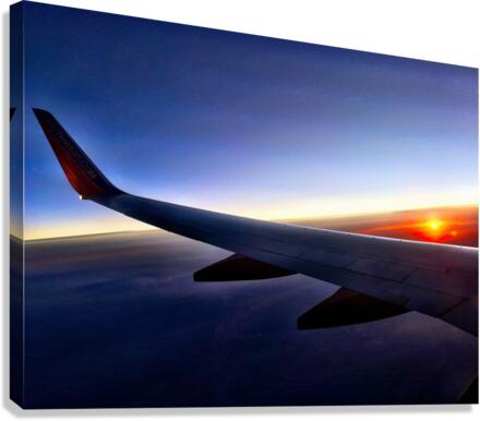 Flying into the Sunset Canvas Print